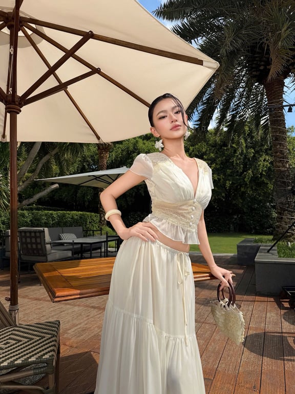 Set áo cánh tiên + chân váy brand OBIBI