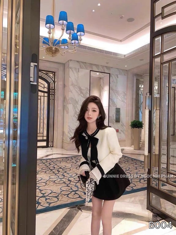 B004- áo dạ viền đen đá kèm nơ QCCC