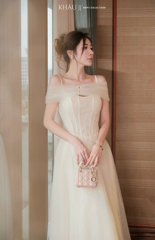 Đầm 2 dây choàng lưới kem Khâu - size M