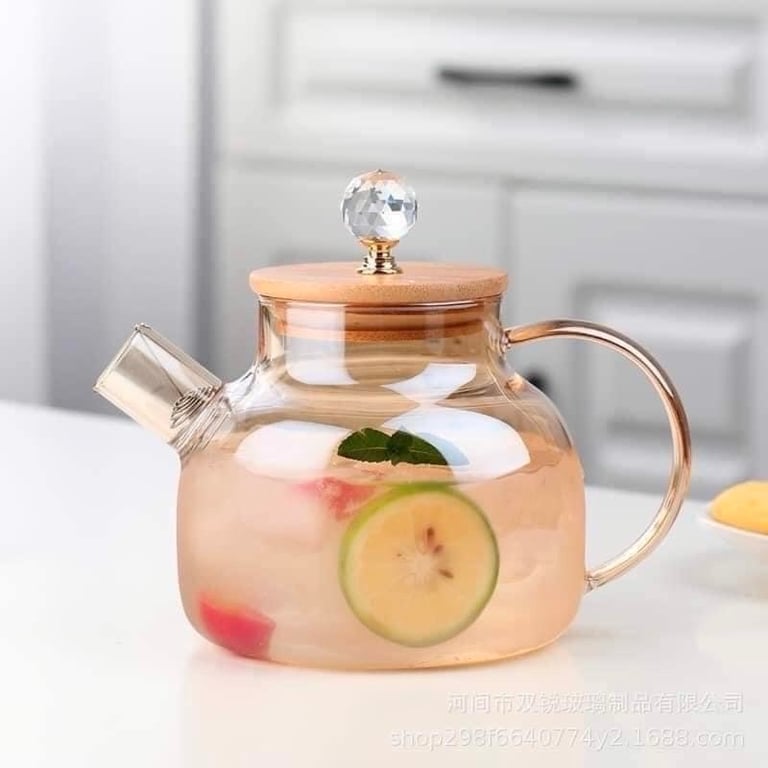 Bình này là thuỷ tinh chịu nhiệt, đun đc trên bếp.