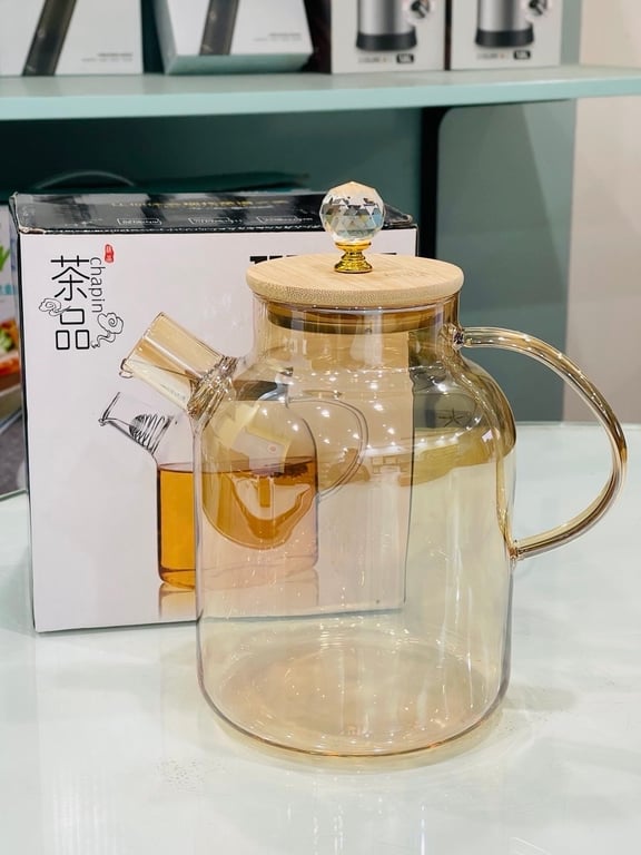 Bình này là thuỷ tinh chịu nhiệt, đun đc trên bếp.