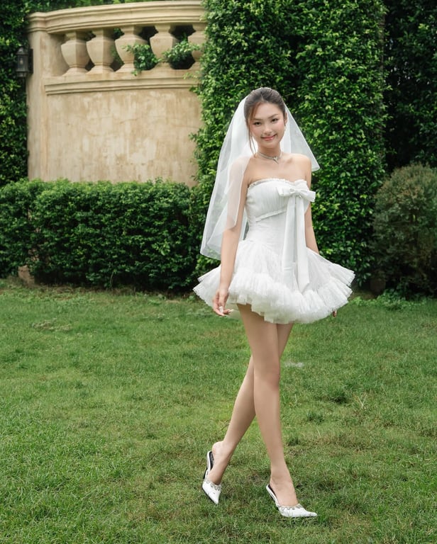 Đầm ngắn nơ bồng LANE CÌ