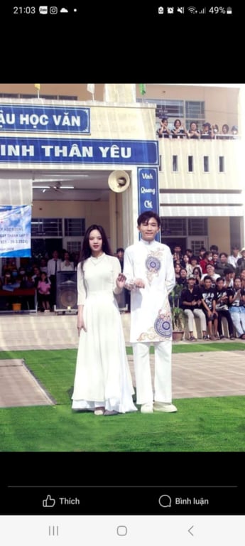 Áo dài trắng trống đồng nam