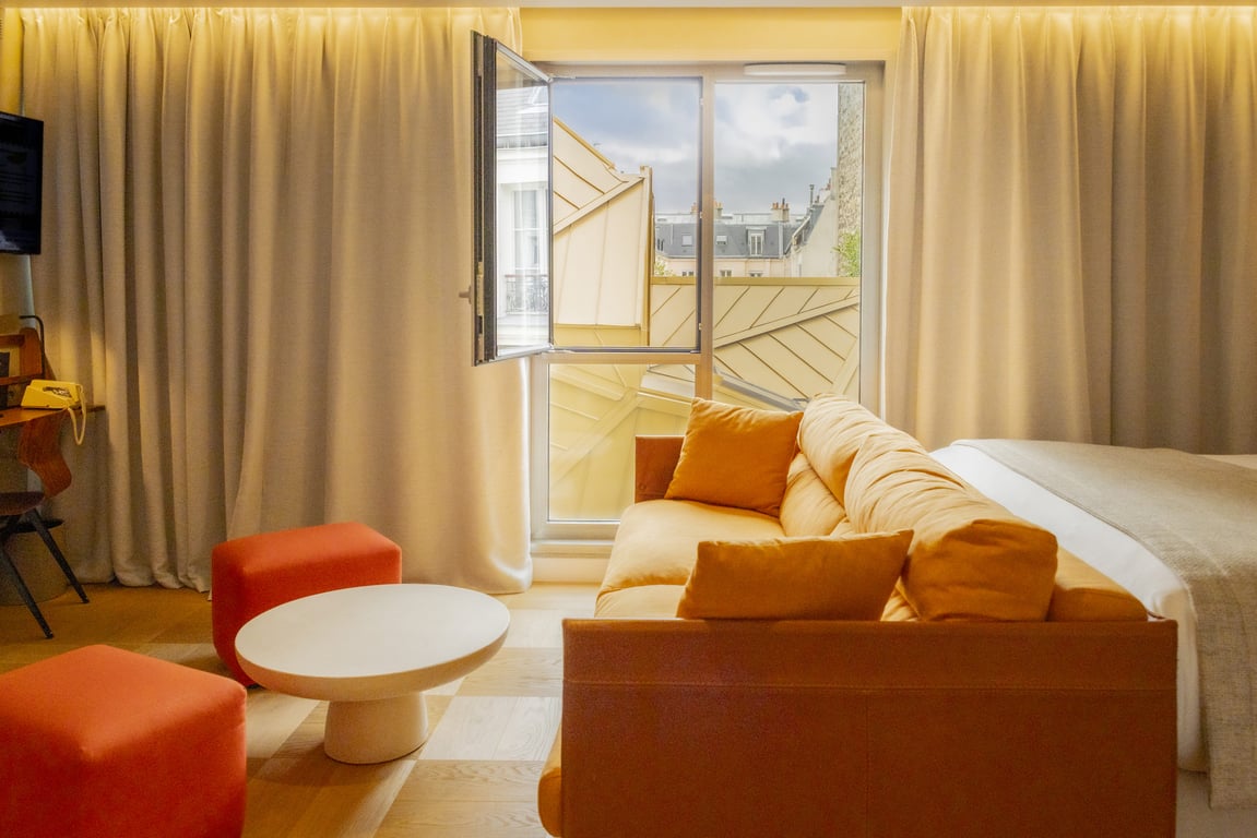 Pilgrim, Paris: orange-toned bedroom