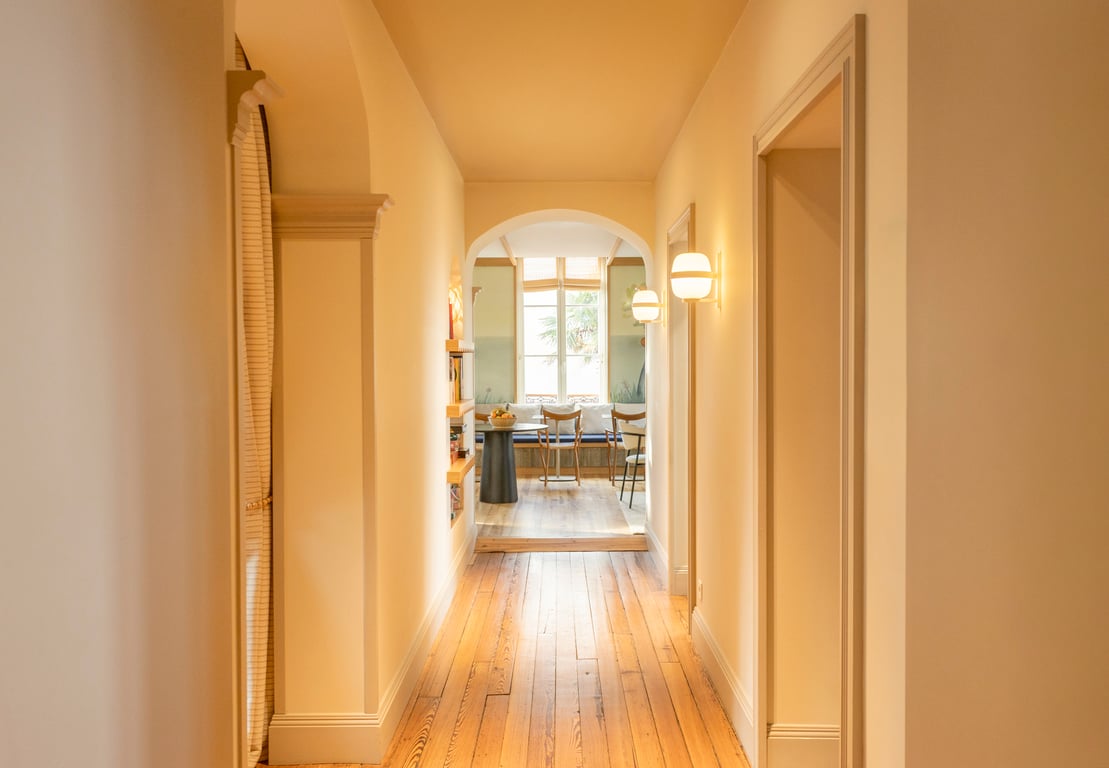 Saint-Julien, Biarritz: warm-toned corridor with wooden floor
