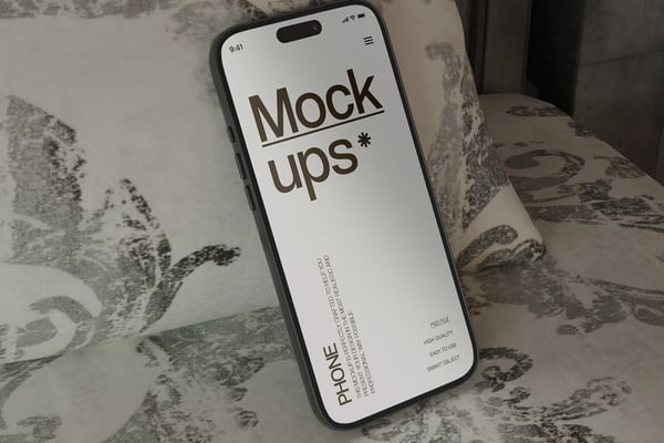 Phone Mockup Leaning On A Patterned Pillow