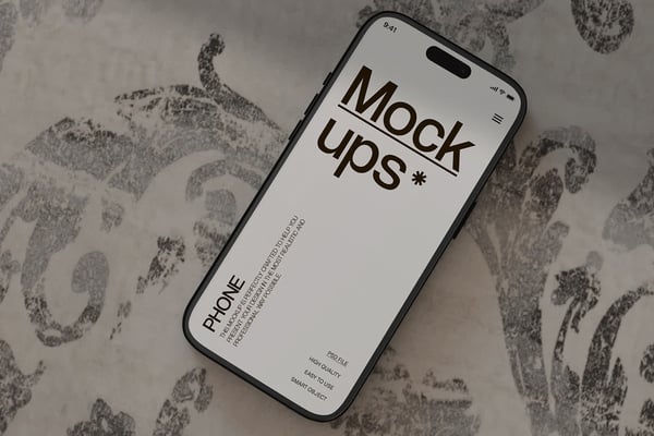 Phone Mockup On A Patterned Bedspread