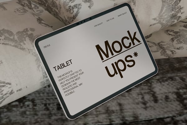 Tablet Mockup On Elegant Patterned Pillows