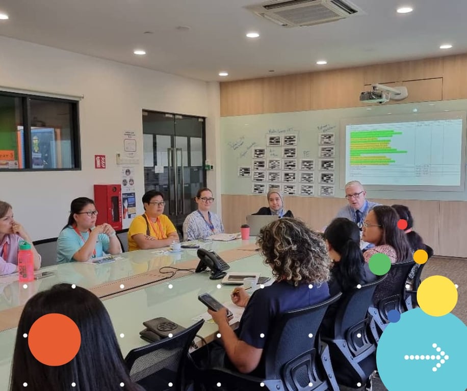 Parents and school management meet to discuss ideas to improve the school experience at a STEPS meeting