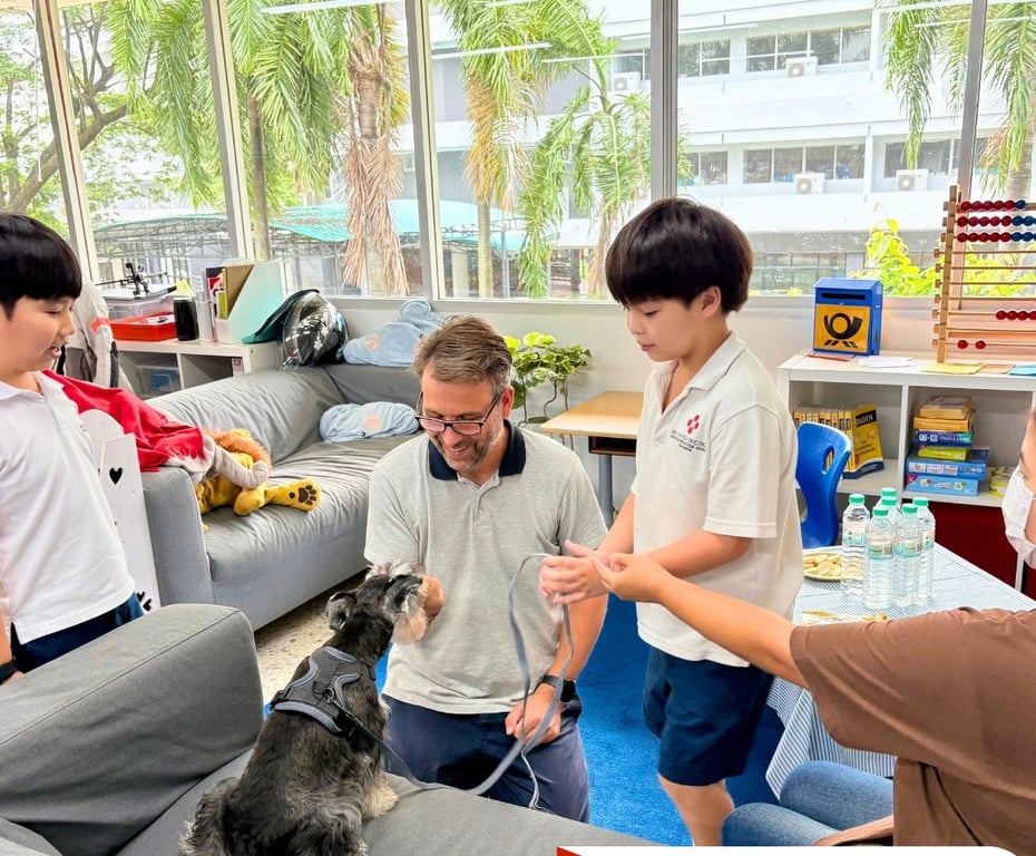 Grade 2 students introducing their pets during classroom Pet Day.