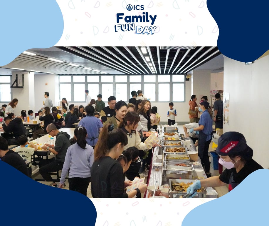 Families enjoying lunch together during ICS Family Fun Day.

