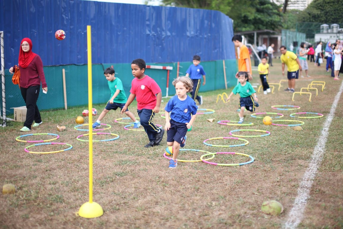 Students take on the challenges at Sports Day while being cheered on by their parents