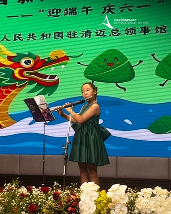 Flute solo performance during the Dragon Boat Festival celebration.