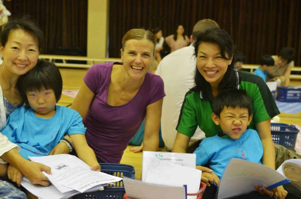 Parents and students gather for a classroom activity.