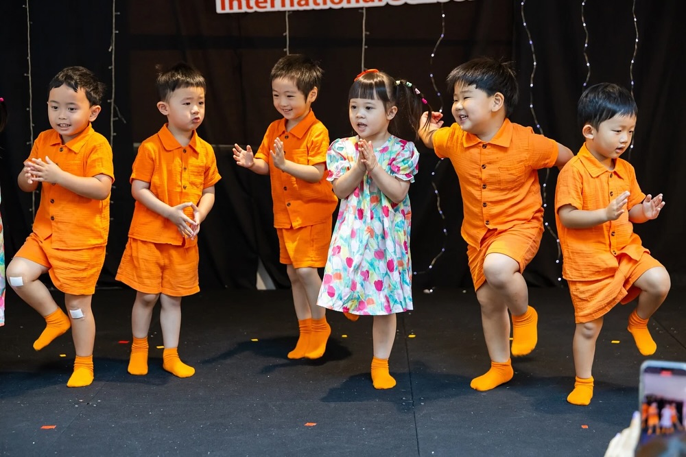 Kindergarten students performing at an event.