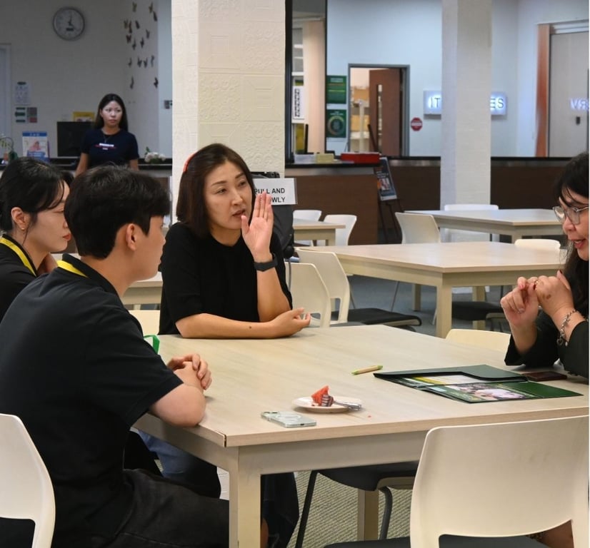 Parents engage in discussion during the POWIIS Open Day on campus.

