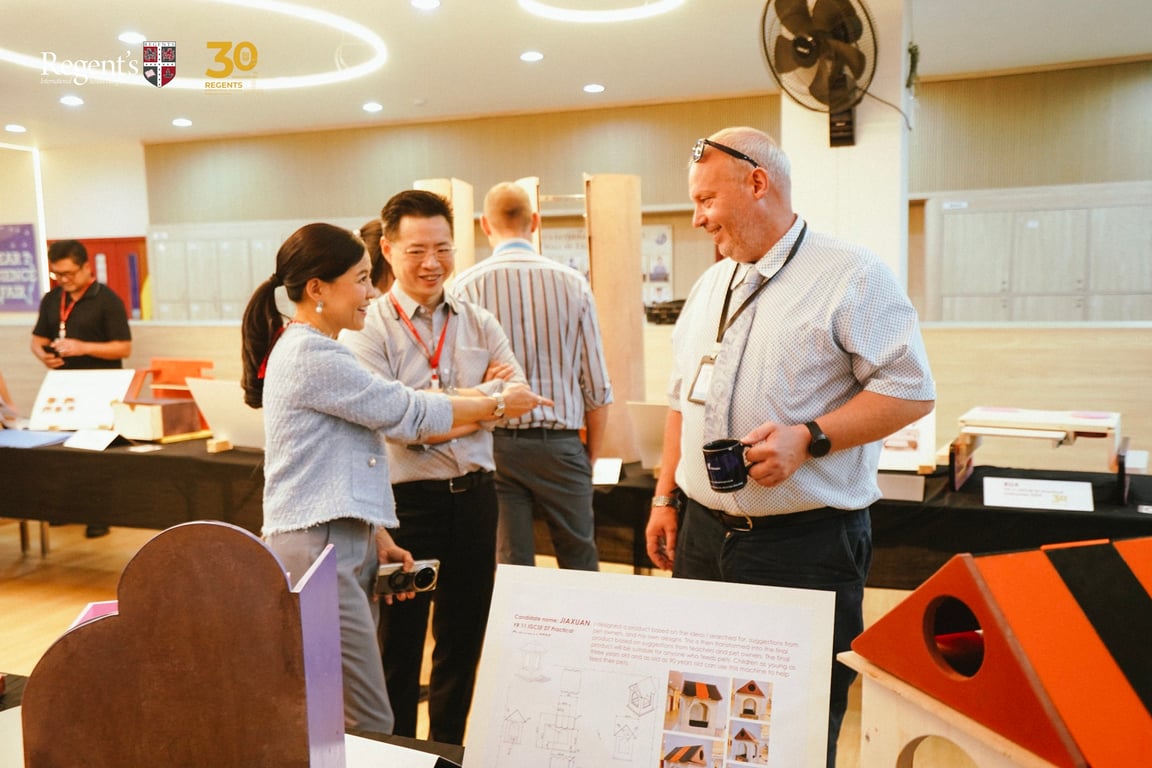 Guests exploring student projects at the Design & Technology Exhibition.