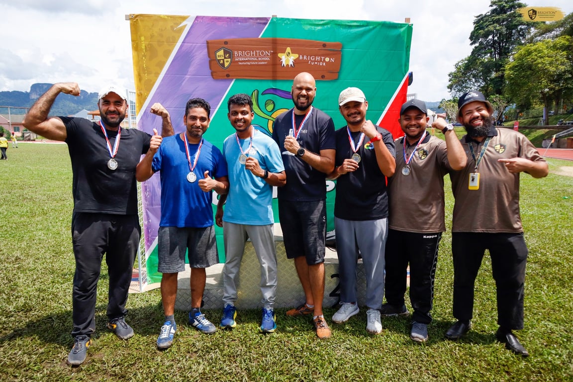 The parents celebrate after the Parents vs Staff match at the BIS Olympics event.