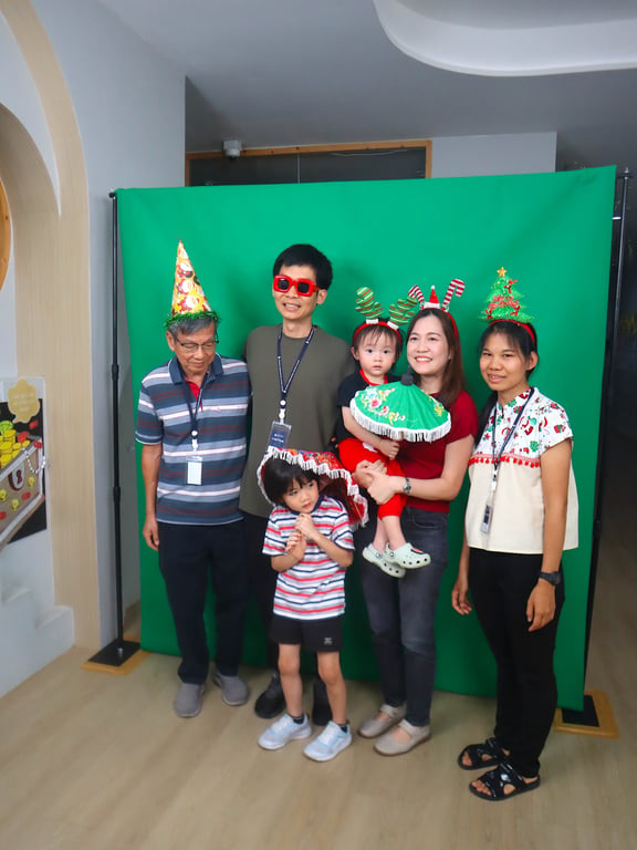 Family photo at the school’s holiday-themed celebration booth.