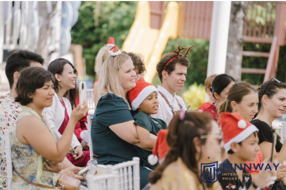 Parents and students attending a Christmas event at Finnway Phuket.