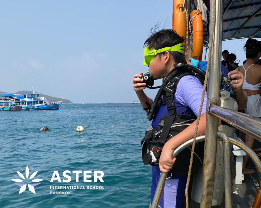 Student prepares for a diving experience on a school trip.