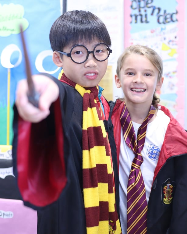 Students dressed as wizards during the Primary Campus Harry Potter Day.