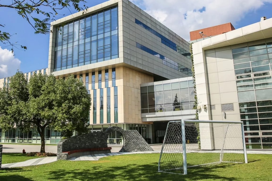 The main courtyard and academic blocks at the Concordia Shanghai campus.