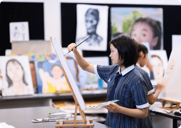 An AIS student enjoying access to the Visual Art Studios