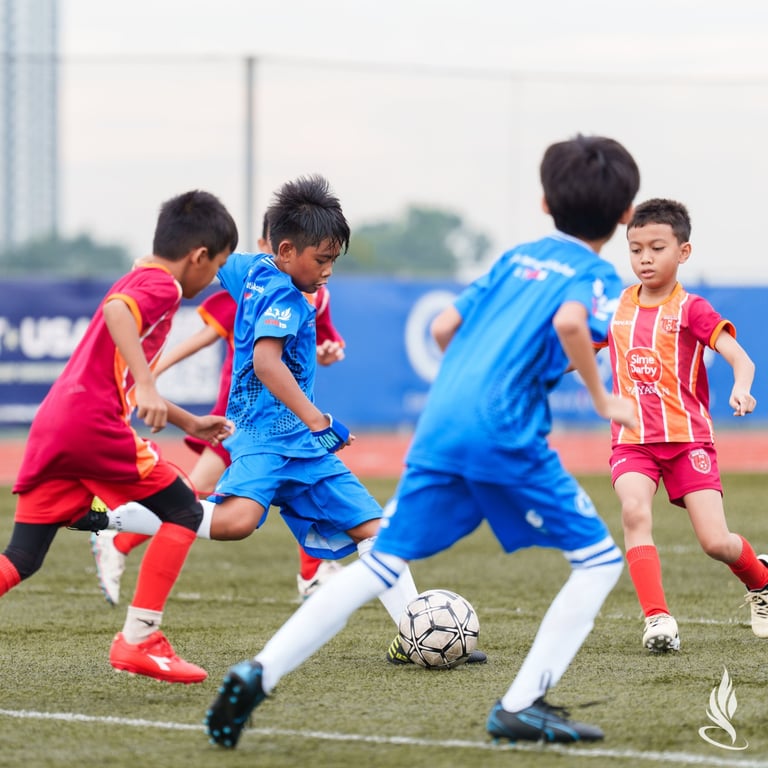 Students from IGB's Everton International Academy compete in a friendly match on campus.