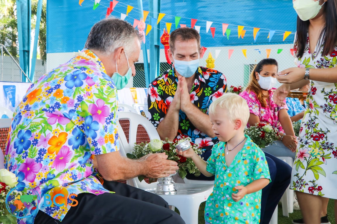 Celebrating Songkran with traditional water blessings.
