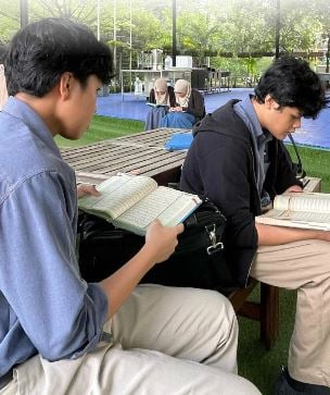 Reflecting deeply during Qur'an Hour at IDRISSI School.