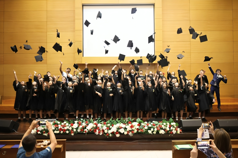 Seniors throw their caps to mark the end of high school.