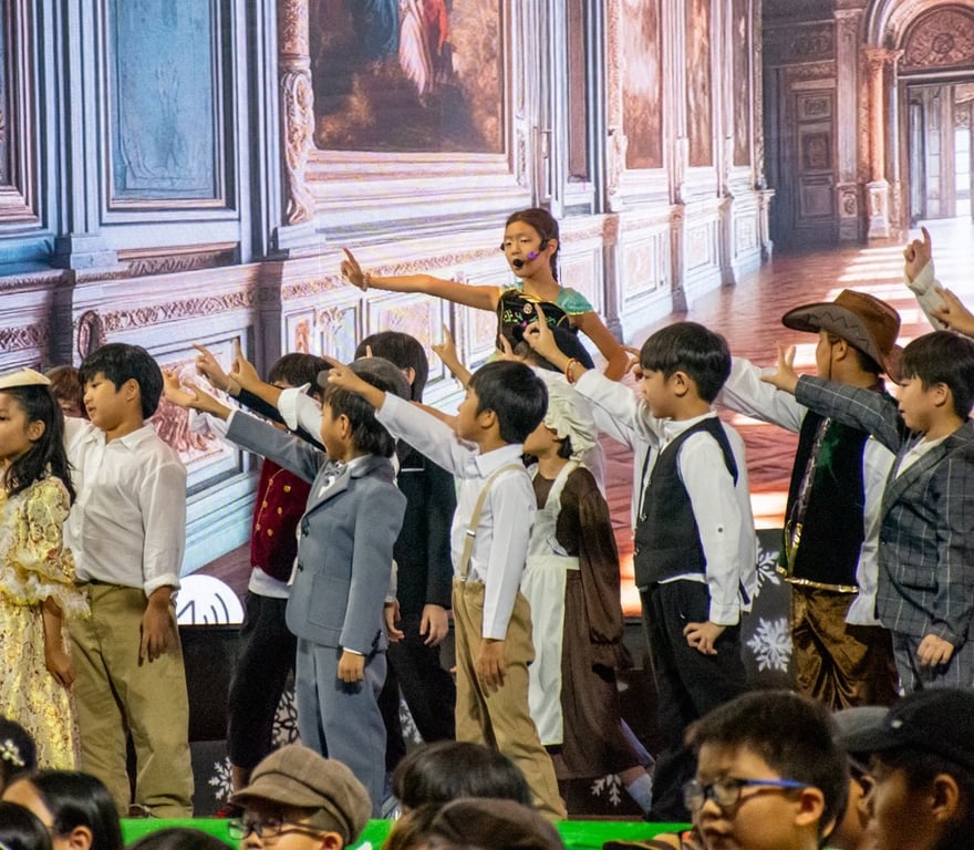Primary students performing in the school production.