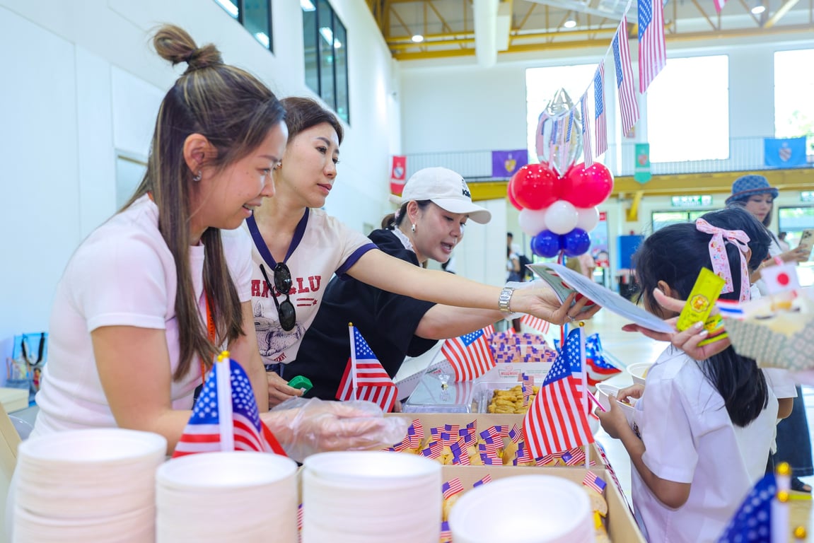 Parents and students sharing food at the Global Food Fayre.