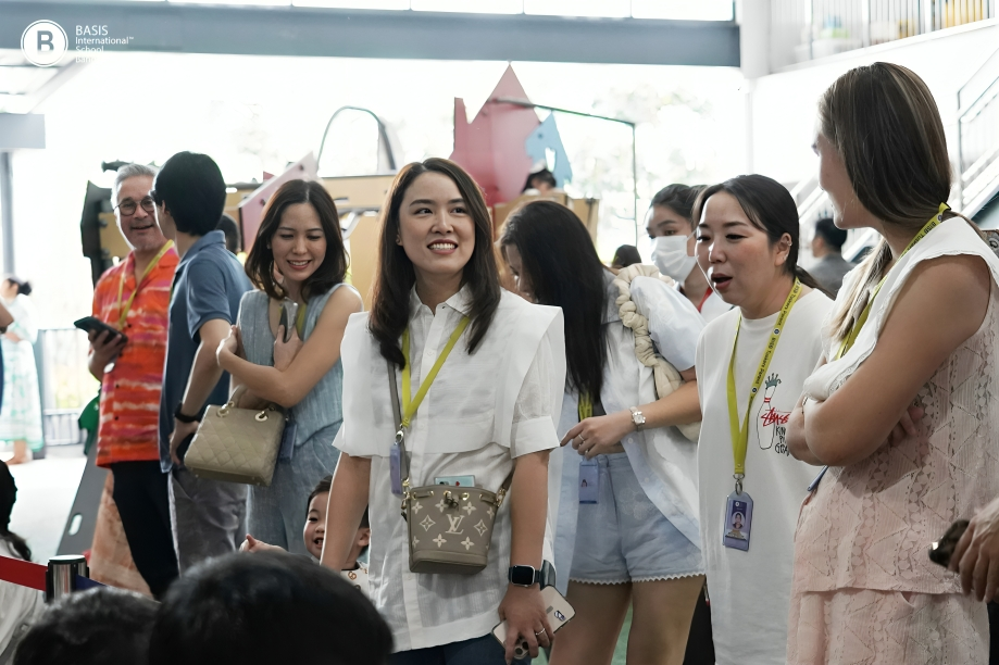 Parents connect and build community during school activities.