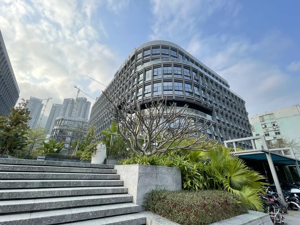 A wide view of the glass-fronted academic buildings at Shekou International School Net Valley Campus.