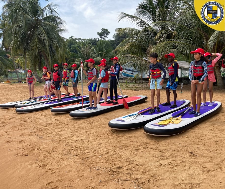 Grade 5 students experienced Paddleboarding on their Camp Adventure trip to Port Dickson