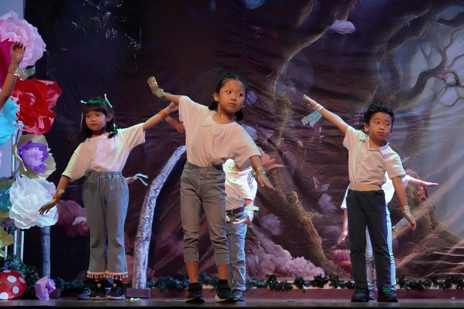 Young performers showcase expressive choreography on stage during Woodlands’ Annual Concert.