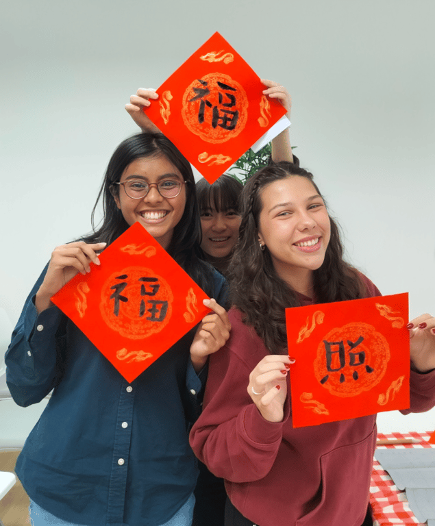 Students explore Chinese culture through calligraphy, knotting, and festive arts to mark Lunar New Year.