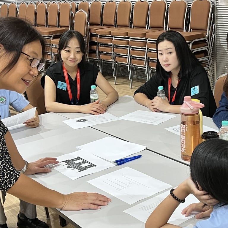 Parents get the opportunity to discuss their children's learning progress at the termly student parent conferences.