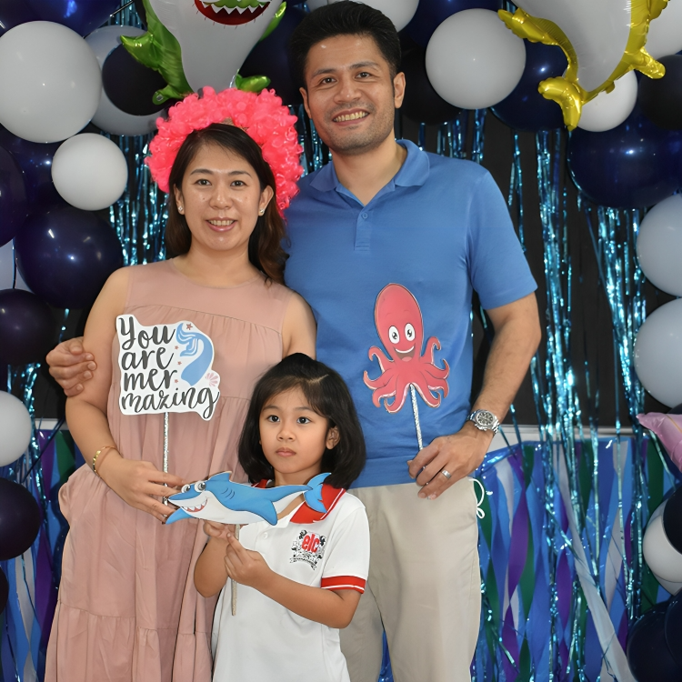 Family photo at the Year 1 Ocean Café celebration.