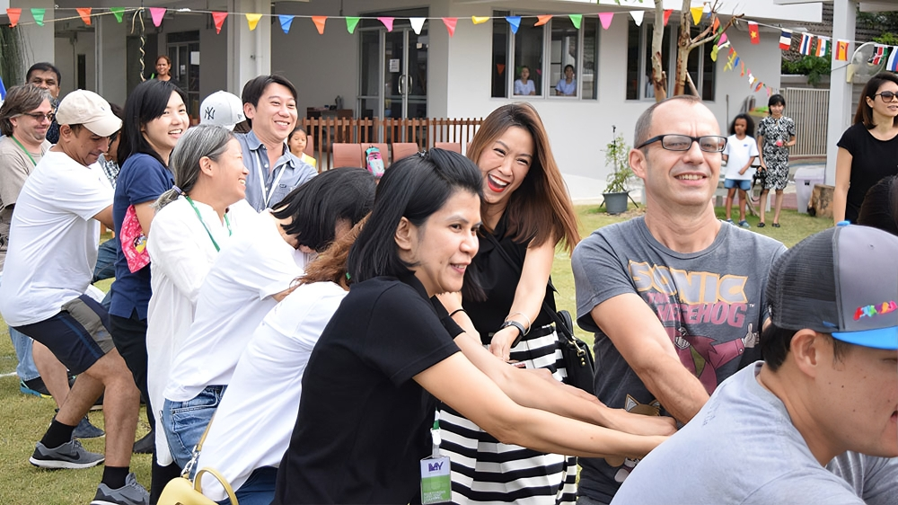 Parents and teachers bond through engaging school community activities.