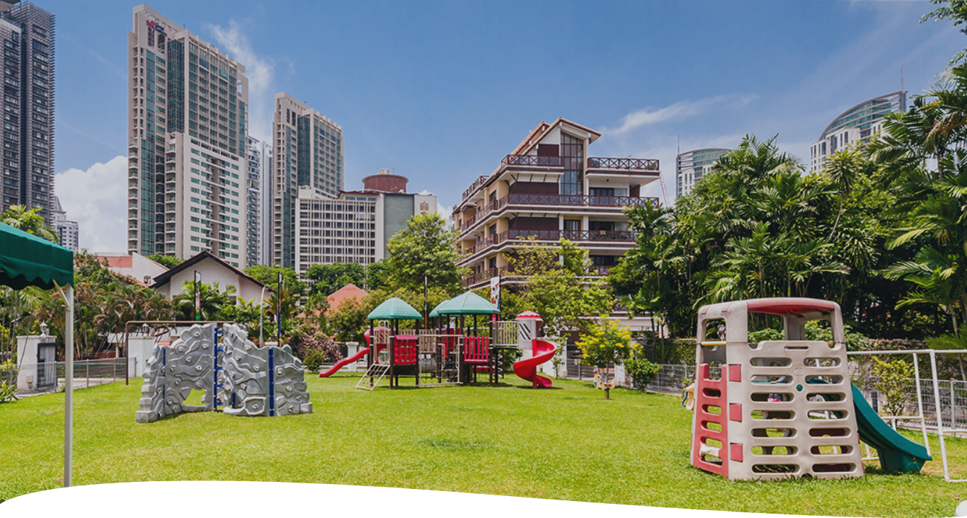 The large outdoor play area filled with equipment and climbing apparatus
