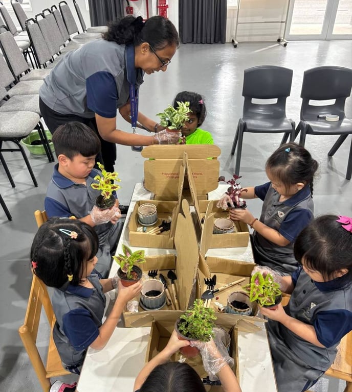 Early Years students explore plant care and sustainability during a hands-on gardening session guided by their teachers.