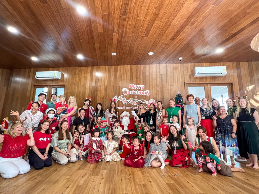 The Lovell Community posing at the Christmas Event.