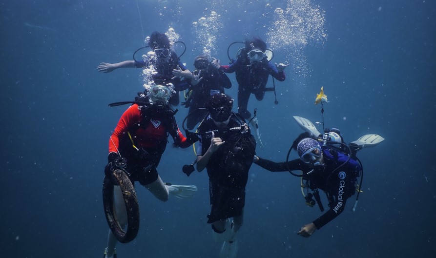 Underwater clean-up in action to safeguard marine life.