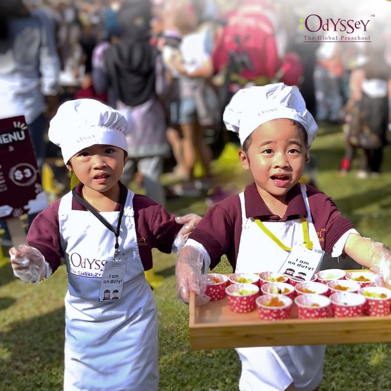 Primary school kids baking muffins during the "Little Chef" competition.