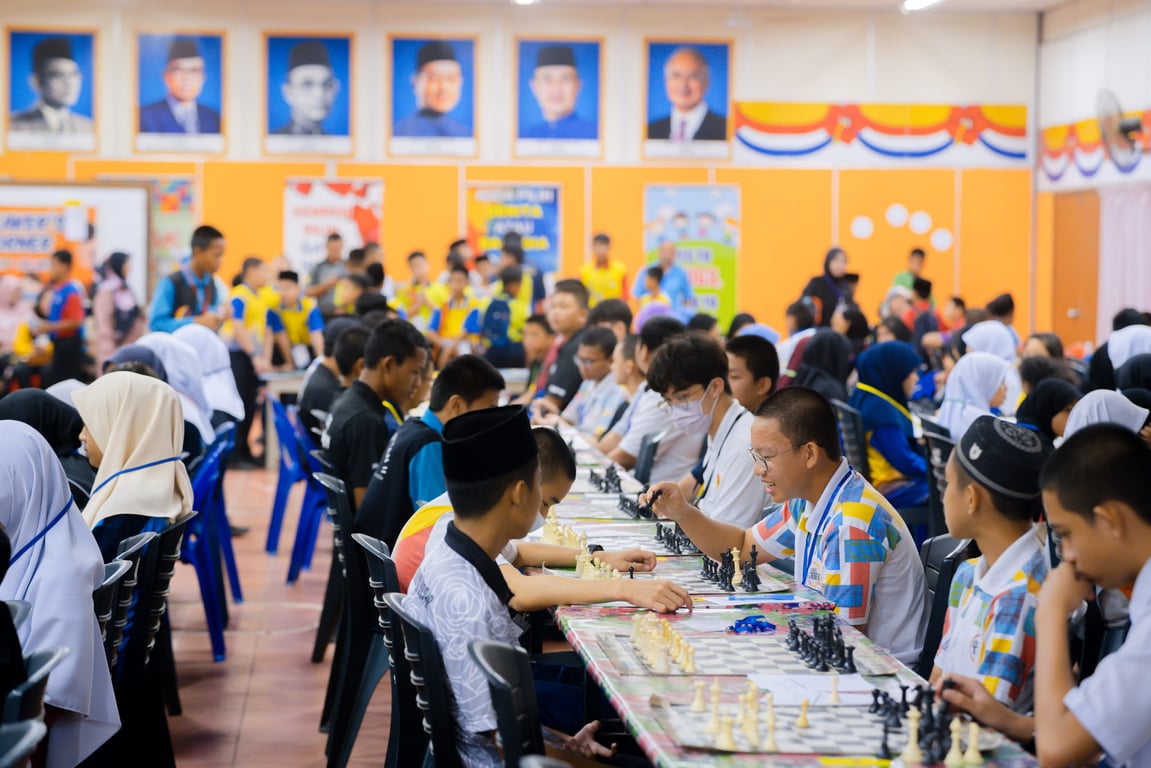 Students participate in a large-scale chess tournament, showcasing critical thinking and strategic planning skills.