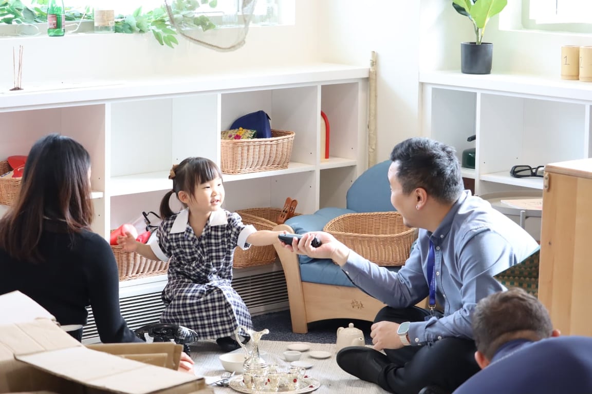 Parents attend class for the 'Stay and Play' morning in the Early Years program