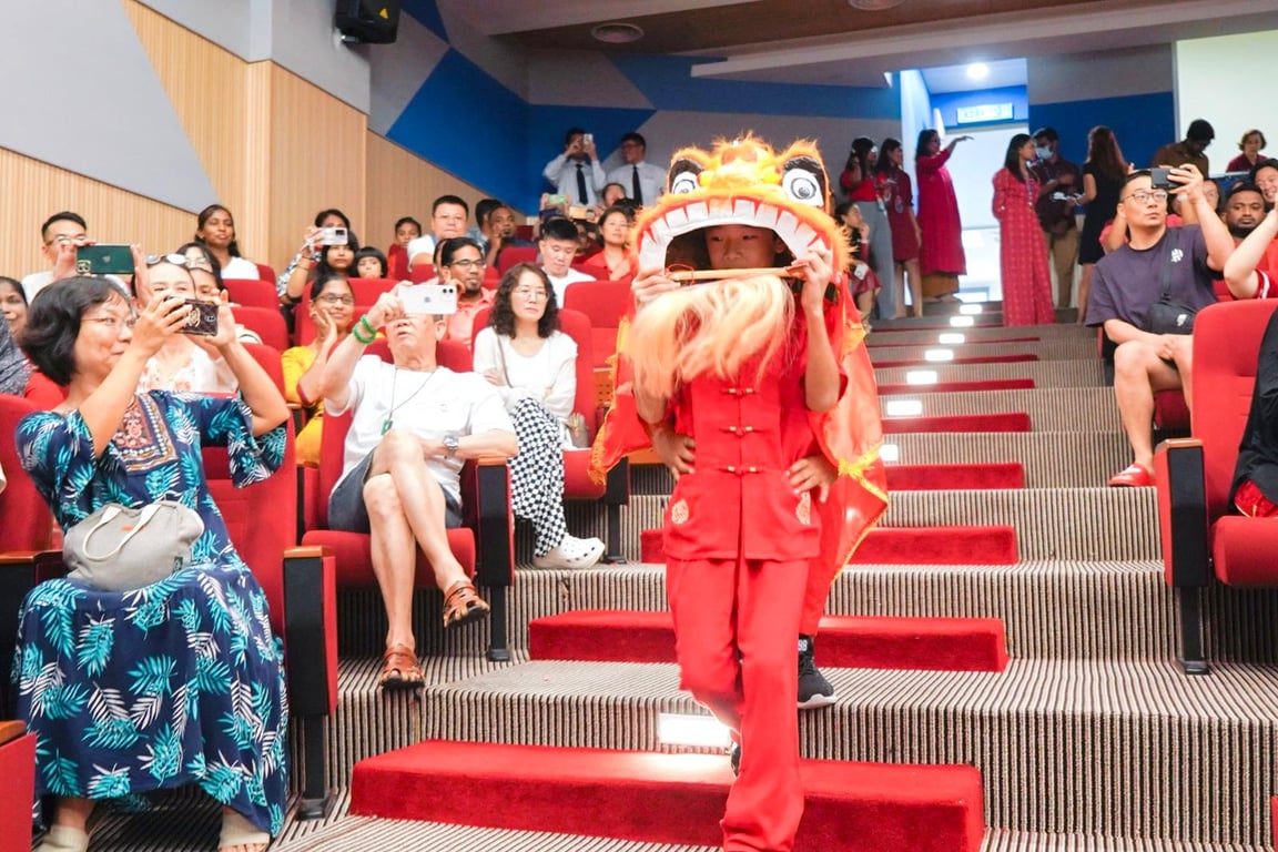 Parents and guests enjoy student performances for Lunar New Year.